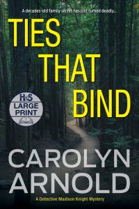 Ties that Bind Large Print Edition by Carolyn Arnold, a dark dirt pathway winding through the trees