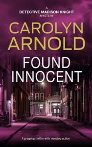 Found Innocent by Carolyn Arnold, a woman in a yellow overcoat running down an alley at night