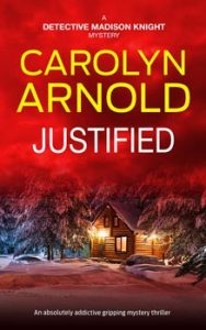 Justified by Carolyn Arnold, an absolutely addictive gripping mystery thriller, The victim built her life on secrets and lies. One of them may have caught up with her… a woman in a green jacket walking up a dirt lane toward an old cabin under a stormy ski. A Detective Madison Knight Mystery.