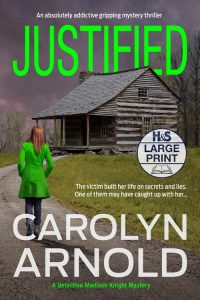 Justified Large Print Edition by Carolyn Arnold, an absolutely addictive gripping mystery thriller, The victim built her life on secrets and lies. One of them may have caught up with her… a woman in a green jacket walking up a dirt lane toward an old cabin under a stormy ski. A Detective Madison Knight Mystery.