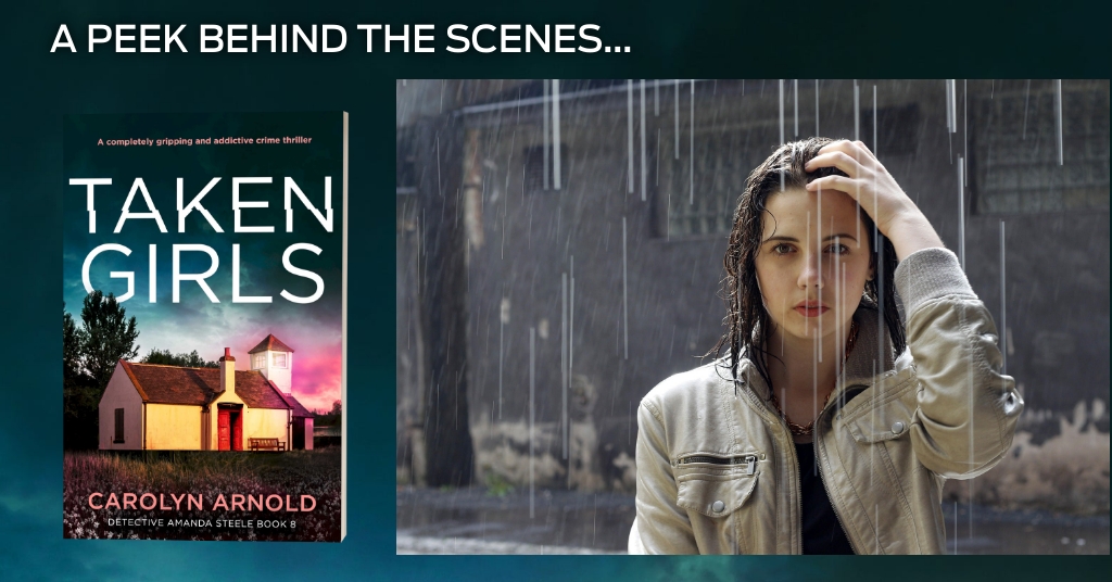 A peak behind the scenes.. Taken Girls by Carolyn Arnold. A woman standing in the rain with wet hair and her left hand on her head.