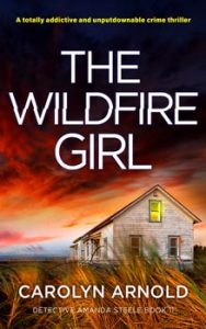 The Wildfire Girl by Carolyn Arnold, a homestead house with a light on in the upper window, behind long grass, under a fiery sky.